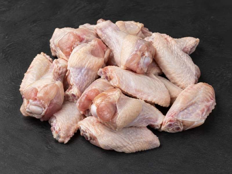 Raw chicken wing drumettes and flats