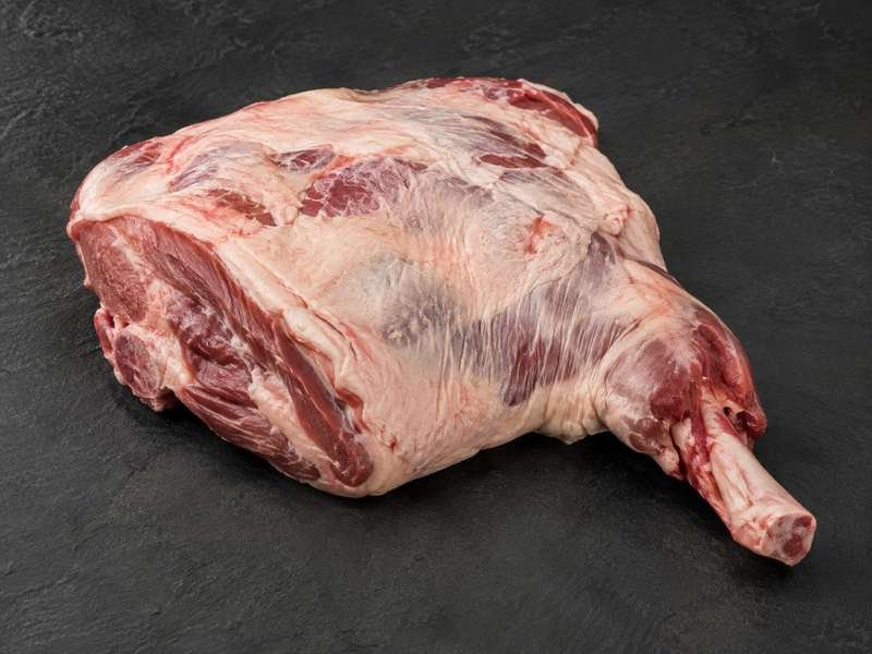 Whole raw bone-in lamb shoulder